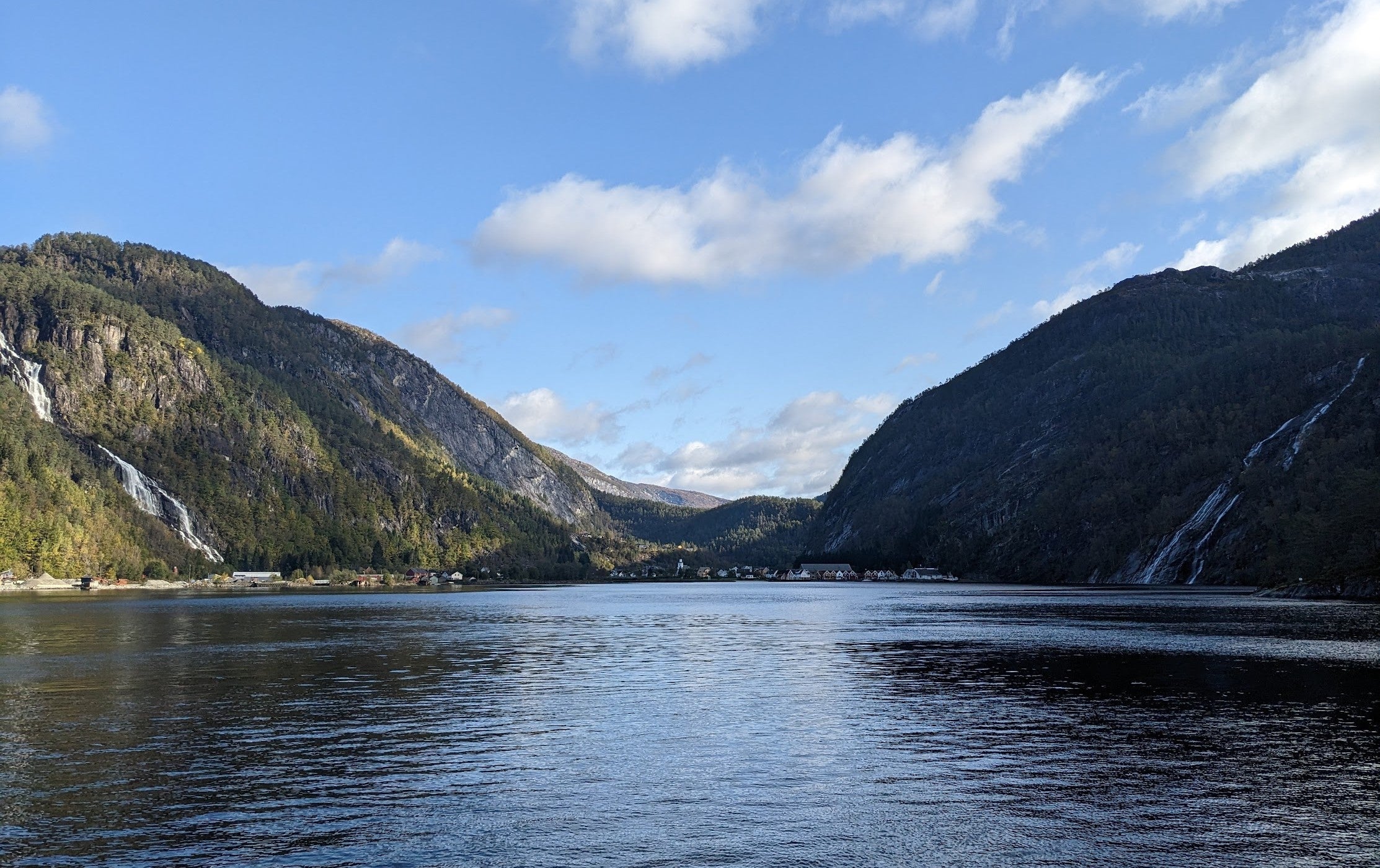 Two mountains with a river running between them.