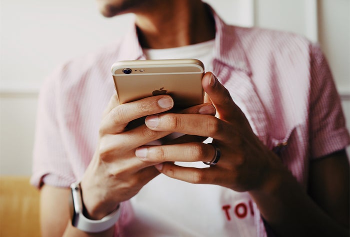 Close up of person holding a smartphone